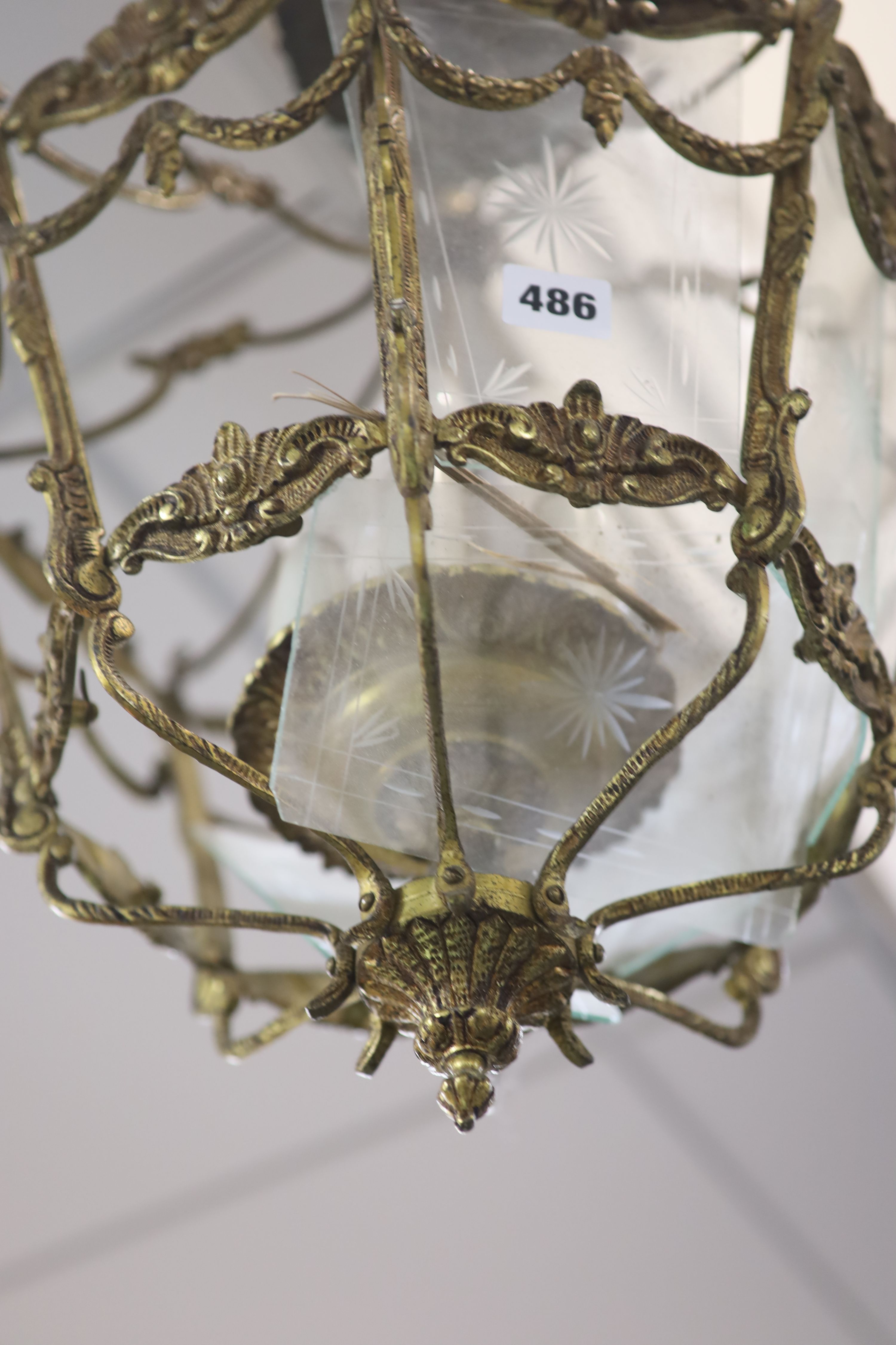 A Victorian gilt metal eight glass panelled hall lantern